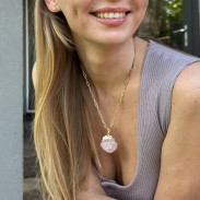 Natural unprocessed Rose Quartz pendant on a gold-plated chain